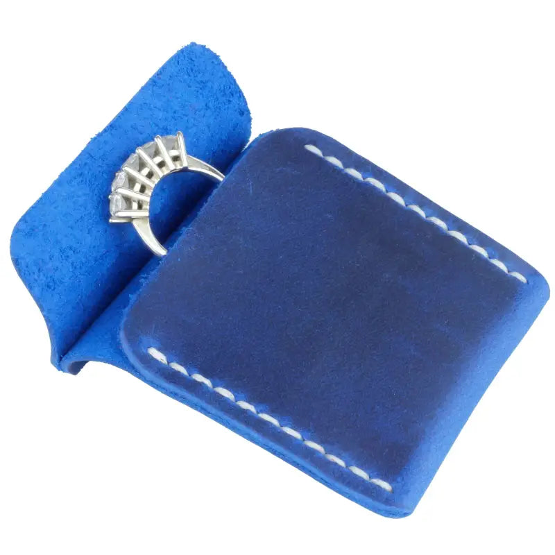 Blue Leather Wedding Ring Case with Silver Ring for Elegant Jewelry Storage