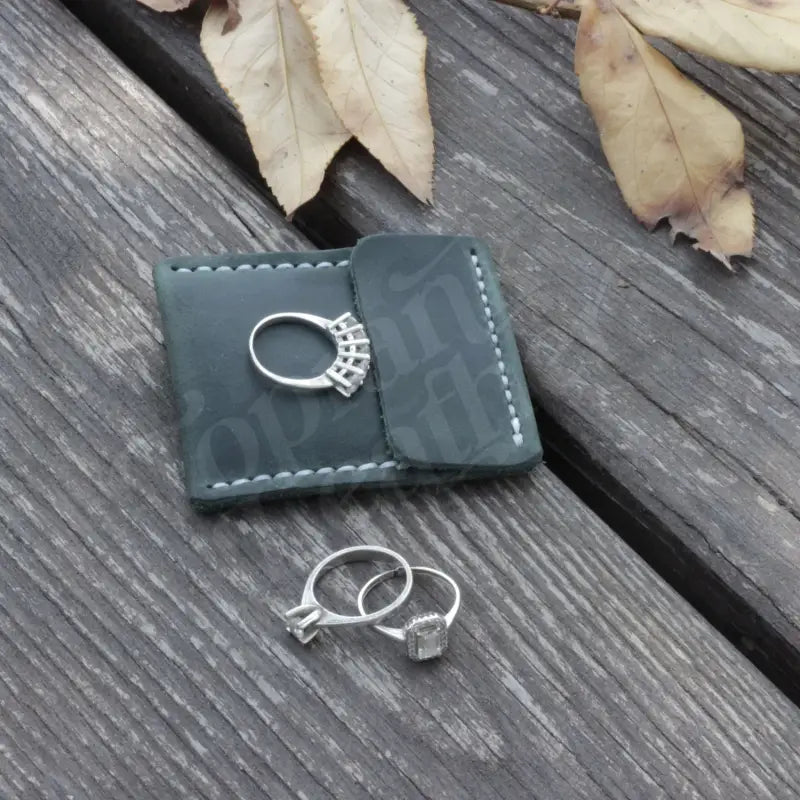 Leather Wedding Ring Case with elegant jewelry rings and stylish leather storage box