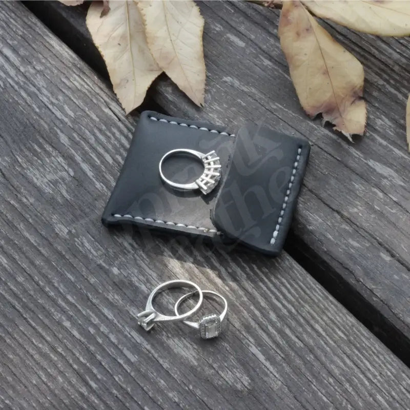 Silver rings in a stylish Leather Wedding Ring Case for elegant jewelry storage