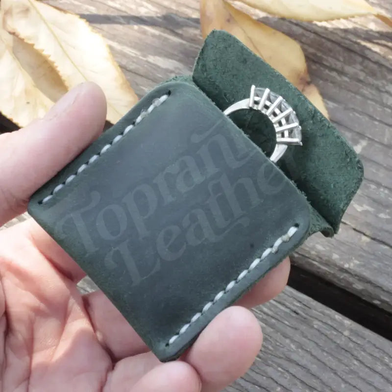 Green leather wedding ring case pouch for elegant jewelry storage and protection