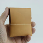 Tan leather card holder from Origa Elite, a stylish handmade leather wallet