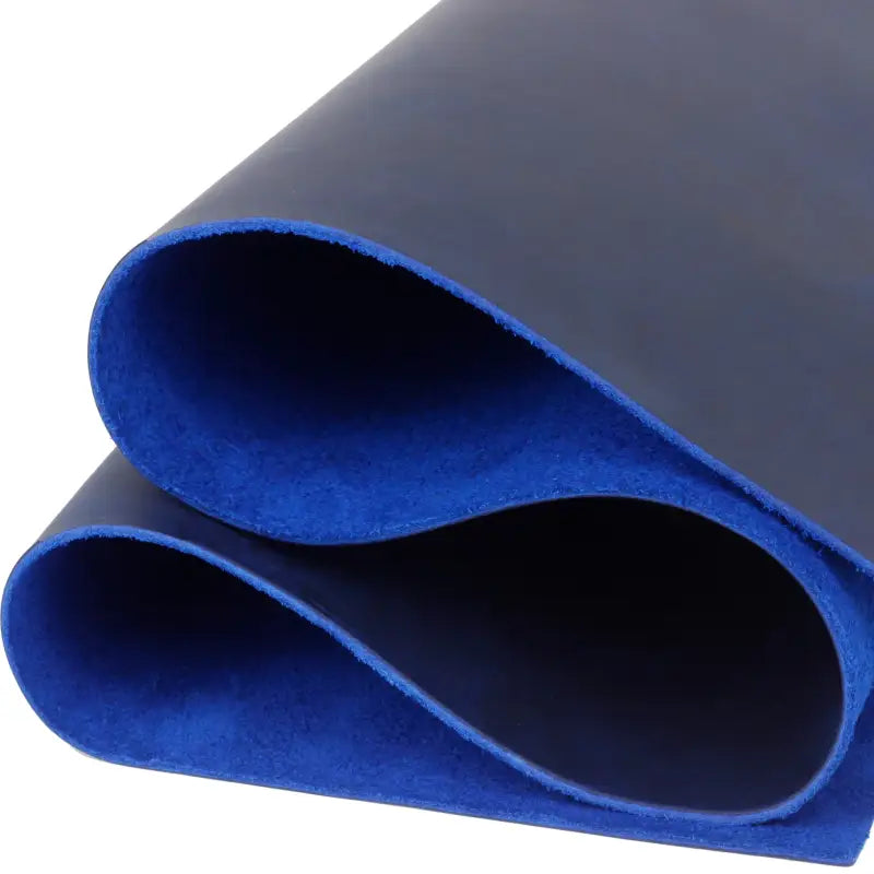 Folded blue leather sheet ideal for crafts, tooling leather, and veg tan leather projects 