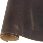 Rolled brown full grain leather sheet for crafts and DIY projects