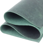 Folded green leather sheet for crafting, tooling leather, and veg tan leather projects 