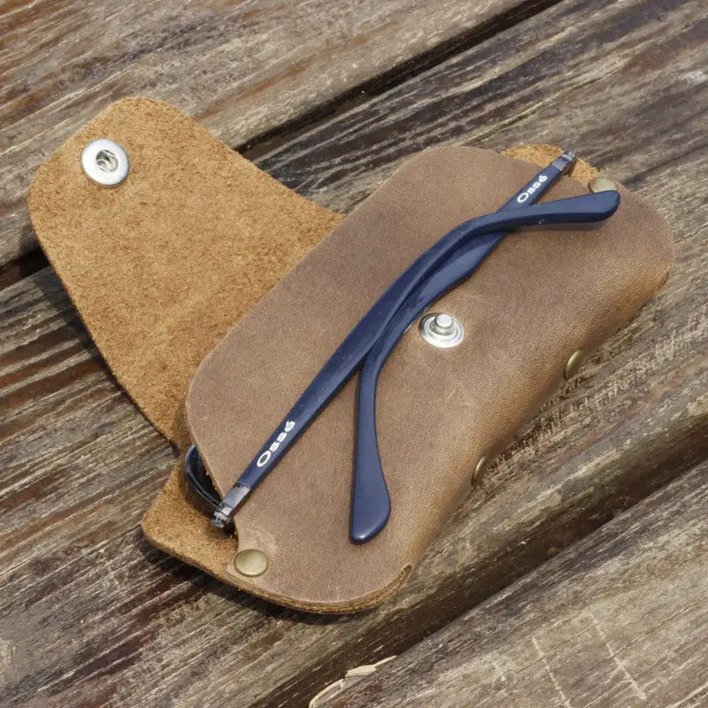 Blue eyeglass temples in a Slim Leather Eyeglass and Sunglasses Case