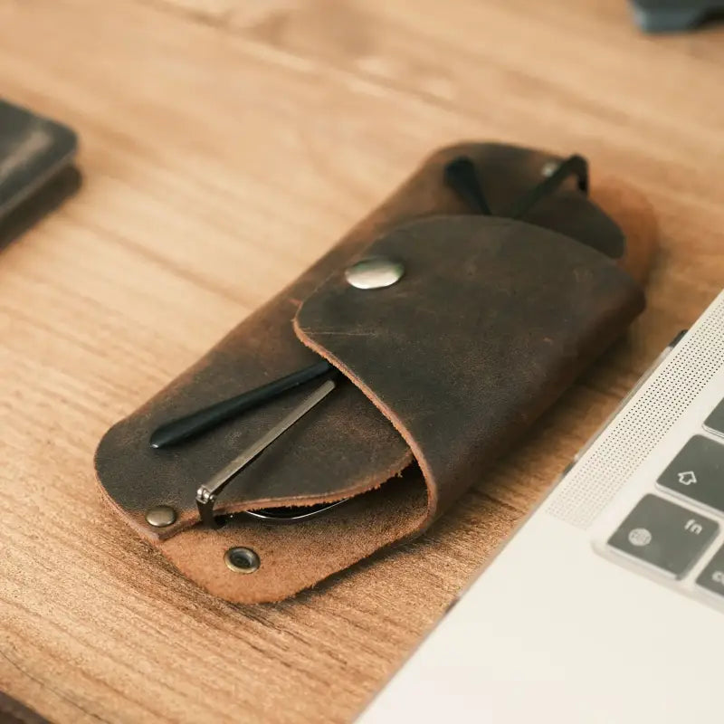 Brown leather eyeglass case displayed as part of a Slim Leather Eyeglass and Sunglasses Case