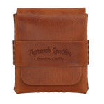 A brown leather card holder or small wallet with a strap closure, featuring an embossed logo that reads 'Toprank Leather' and 'Premium Quality' on a plain white background. 