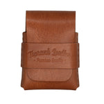 A brown leather card holder or wallet with a strap closure, featuring an embossed logo that reads 'Toprank Leather + Premium Quality +' on a plain white background. 