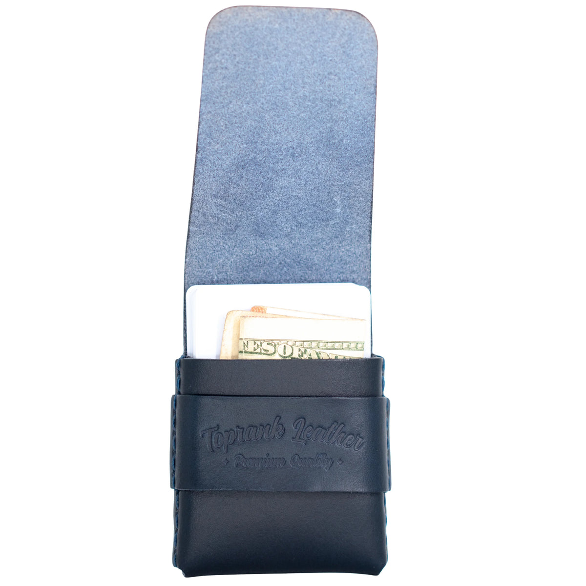 A black leather card holder wallet with a blue suede-like interior flap, holding a credit card and a dollar bill. The leather strap features an embossed logo reading 'Topman's Leather'. 